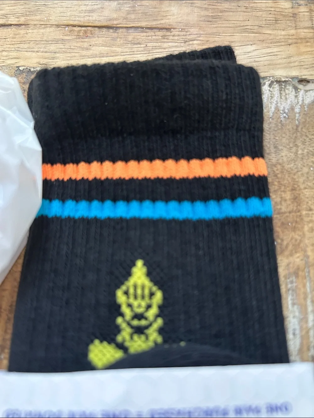 Bombas Black Crew Socks with Orange, Blue, and Yellow Accents for Children